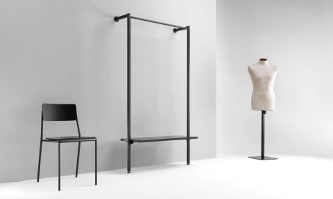 Wall unit with clothes bar and shelf for contract furniture