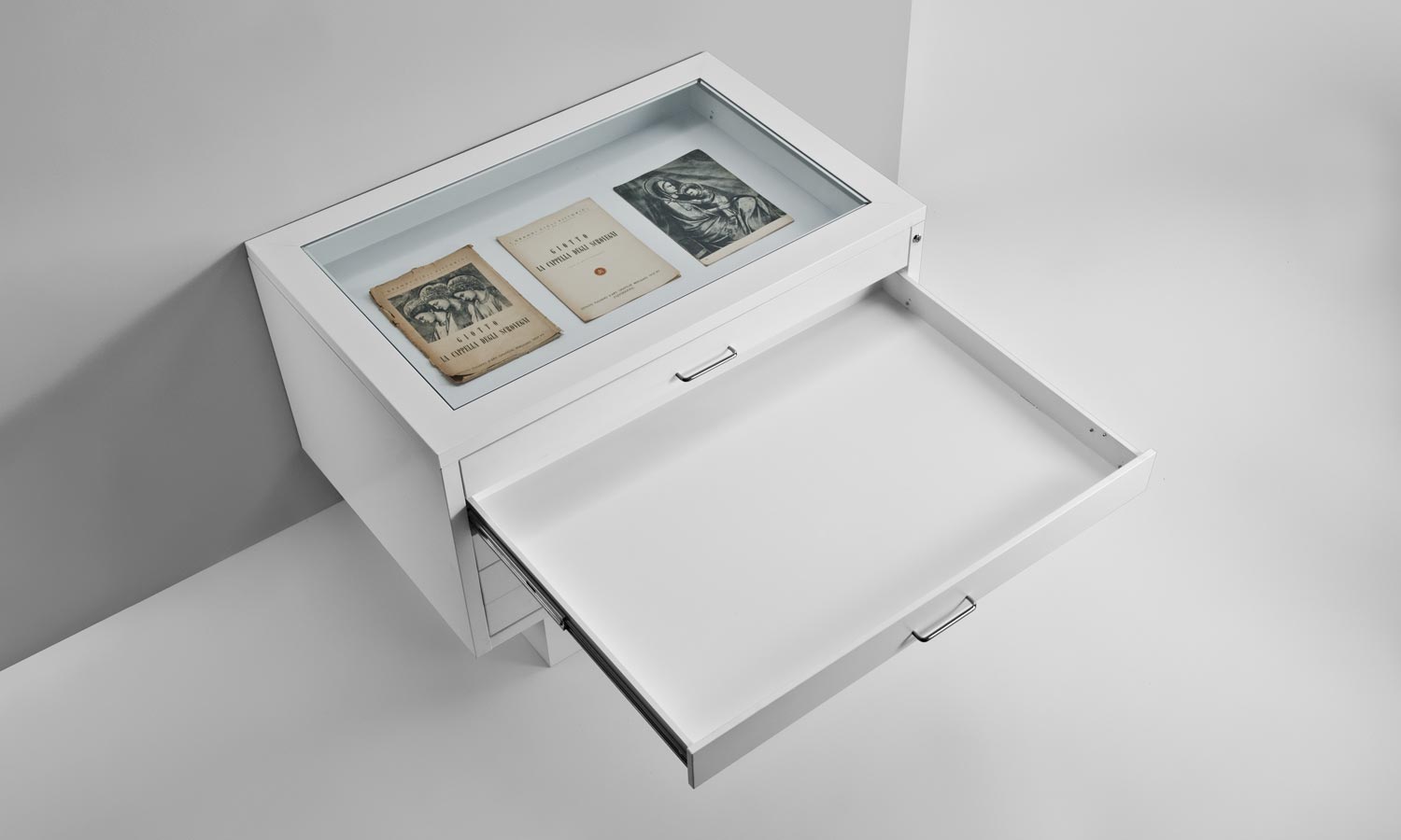 Glass top showcase on drawer unit for museum